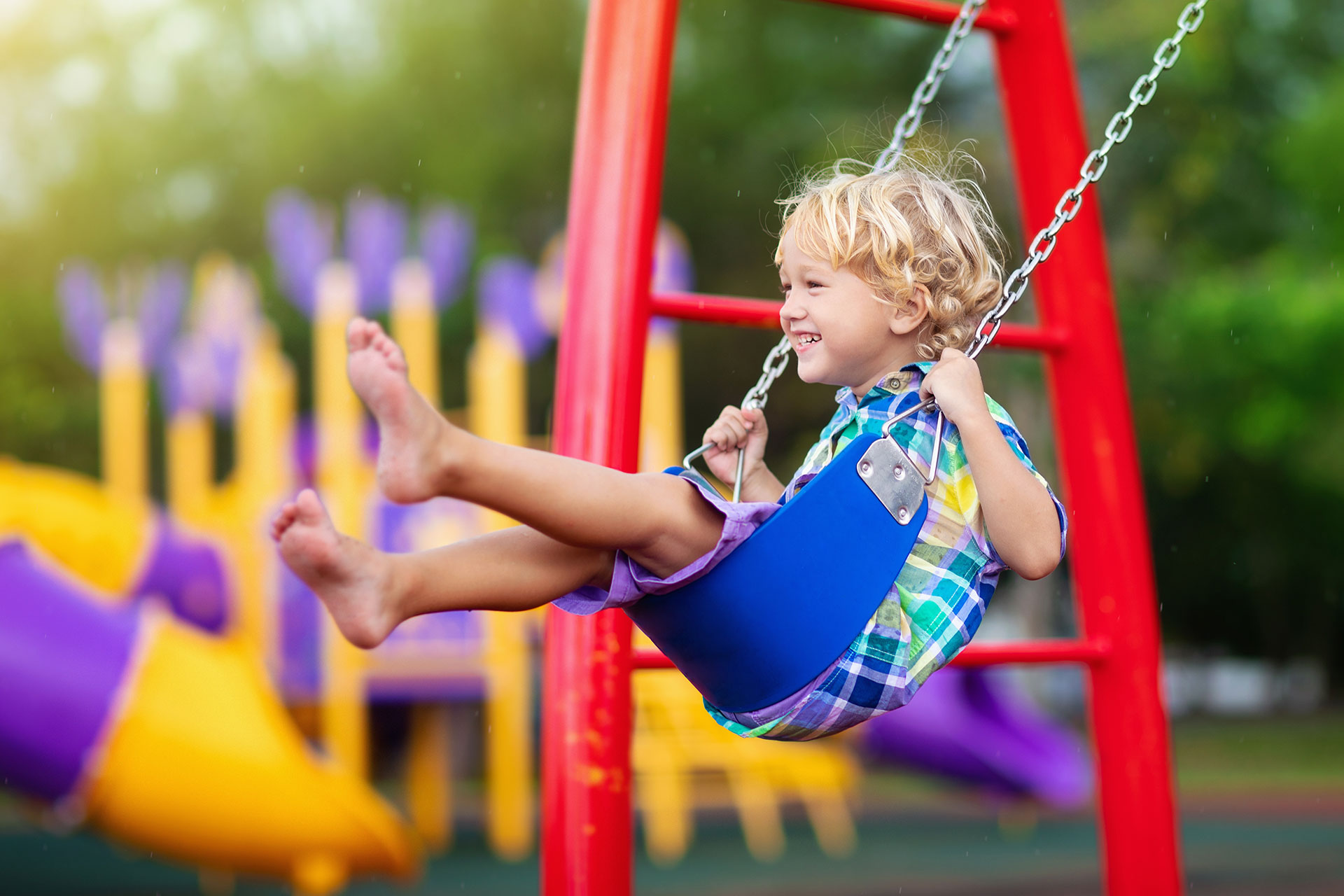 Child Safely Playing on Playground